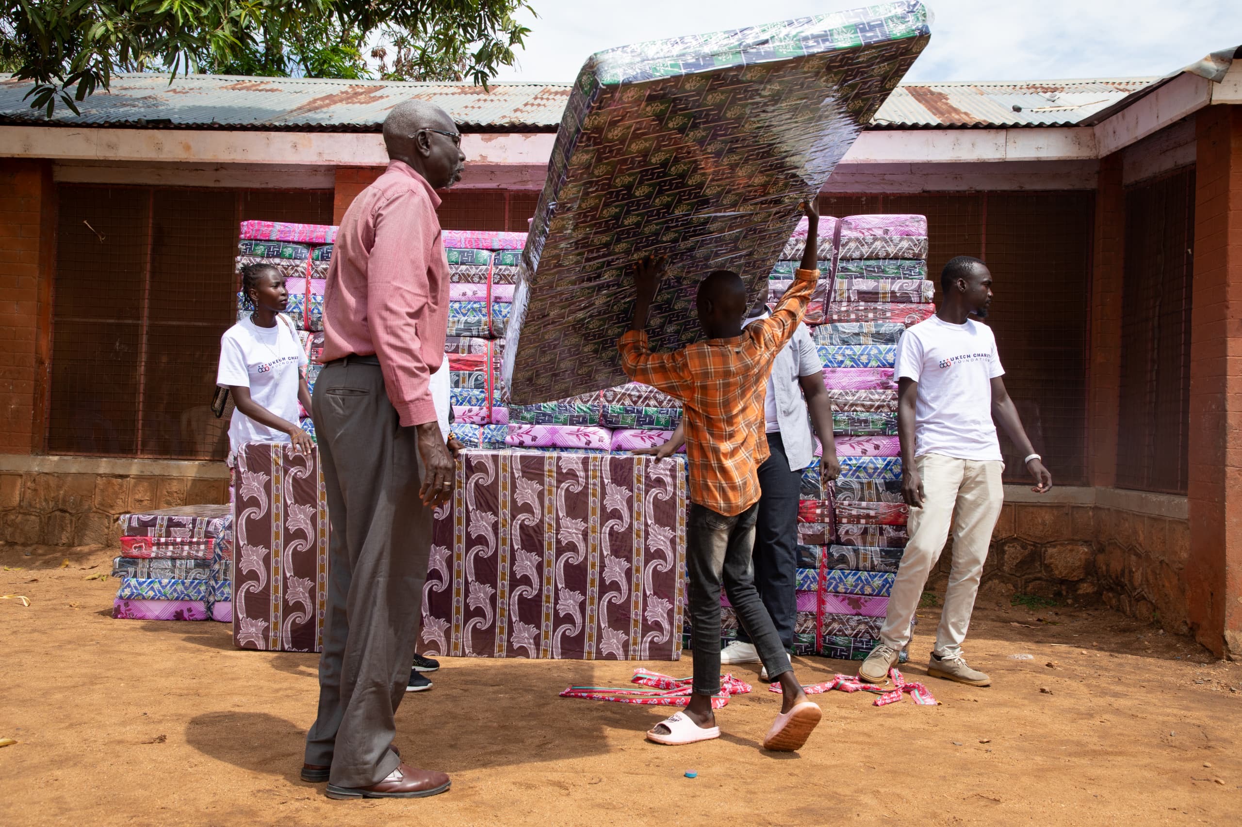 Donating mattresses to Juba Home Orphanage.